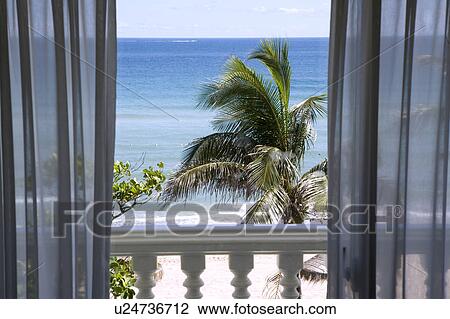 The scenery of the seaside from the balcony View Large Photo Image Stock Image - The scenery of the seaside from the balcony. Fotosearch