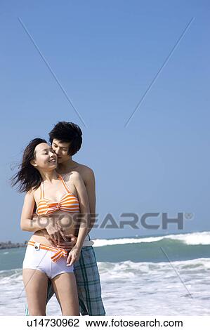 Young couple bonding together View Large Photo Image Stock Image - Young couple bonding together. Fotosearch