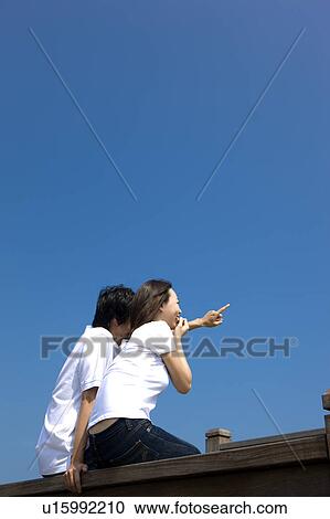 Young couple bonding together View Large Photo Image Stock Image - Young couple bonding together. Fotosearch