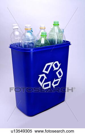 Stock Photography - A recycling bin with empty bottles. Fotosearch