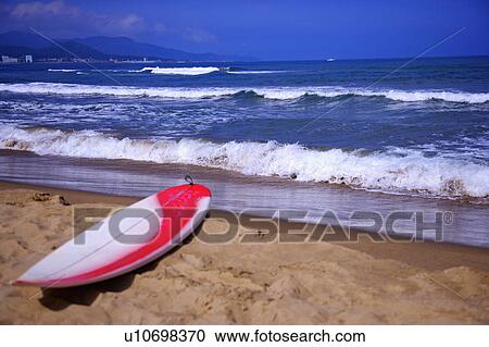 Close-up of a surfboard on beach View Large Photo Image Stock Image - Close-up of a surfboard on beach. Fotosearch