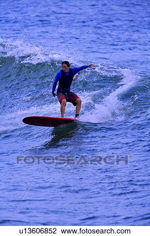 Man surfing on the sea skillfully View Large Photo Image Stock Image - Man surfing on the sea skillfully. Fotosearch