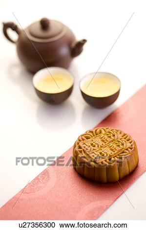 Close-up of tea sets and a moon cake for mid-autumn festival View Large Photo Image Stock Image - Close-up of tea sets and a moon cake for mid-autumn festival. Fotosearch