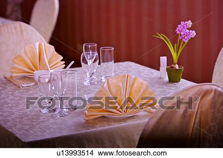 Close-up of place settings on the dining table View Large Photo Image Picture - Close-up of place settings on the dining table. Fotosearch