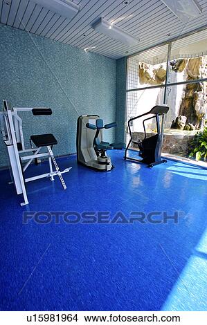 Exercise machine in the gymnasium View Large Photo Image Picture - Exercise machine in the gymnasium. Fotosearch