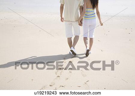 Stock Image - Back figure of Japanese couple. Fotosearch