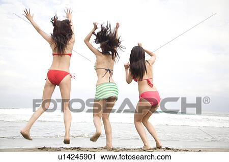 Stock Image - Back figure of Japanese weman in swimsuit. Fotosearch