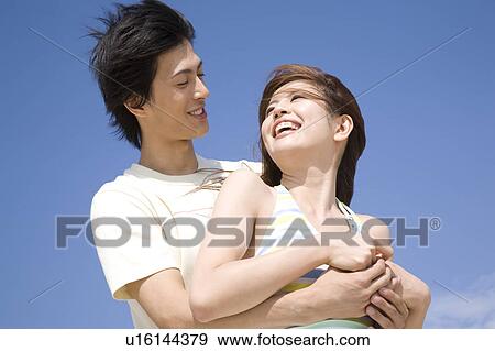 Stock Photo - Japanese couple gazing each other. Fotosearch