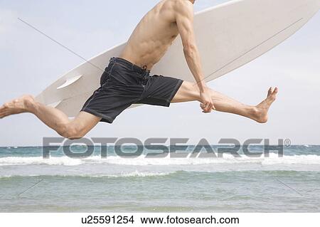 Japanese man jumping View Large Photo Image Picture - Japanese man jumping. Fotosearch