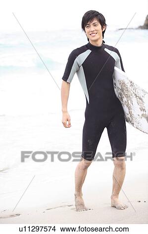 Young Japanese surfer View Large Photo Image Picture - Young Japanese surfer. Fotosearch