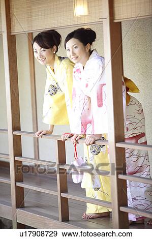 Japanese woman looking at outside from corridor View Large Photo Image Stock Photo - Japanese woman looking at outside from corridor. Fotosearch
