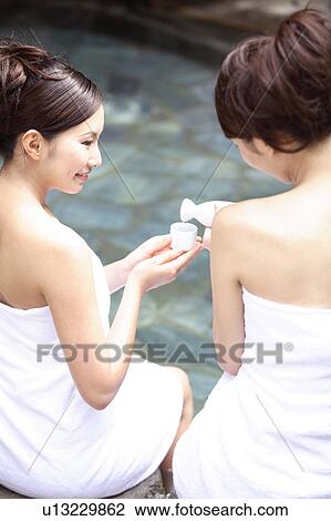 Japanese women drinking sake in a open-air bath View Large Photo Image Stock Image - Japanese women drinking sake in a open-air bath. Fotosearch
