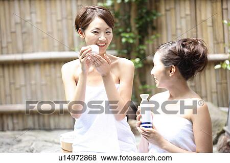 Japanese women drinking sake in a open-air bath View Large Photo Image Stock Photo - Japanese women drinking sake in a open-air bath. Fotosearch
