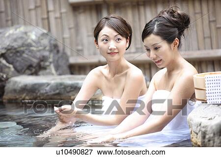Stock Photo - Japanese women in a open-air bath. Fotosearch