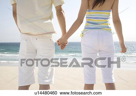 Stock Image - Back figure of Japanese couple. Fotosearch