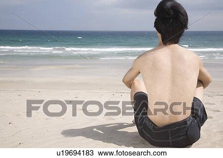 Stock Image - Back figure of Japanese man. Fotosearch