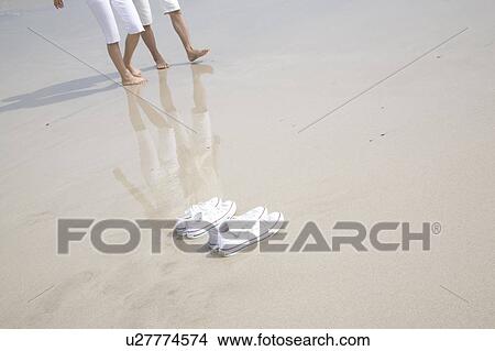 Foot of couple and shoes View Large Photo Image Picture - Foot of couple and shoes. Fotosearch
