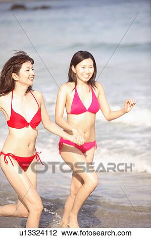 Stock Image - Japanese women in swimsuit. Fotosearch