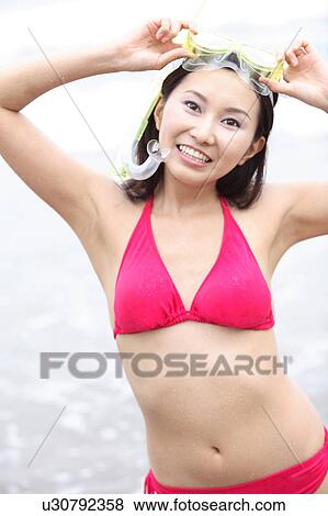 Japanese womon in swimsuit View Large Photo Image Stock Photo - Japanese womon in swimsuit. Fotosearch