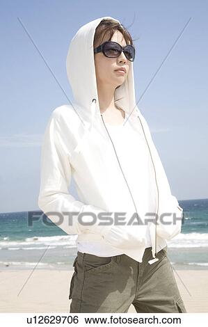 Portrait of Japanese woman on a beach View Large Photo Image Stock Photograph - Portrait of Japanese woman on a beach. Fotosearch