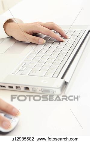 Stock Image - Hand of office lady. Fotosearch
