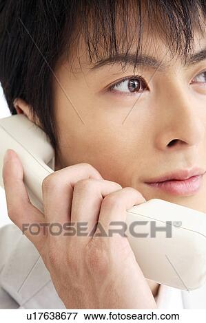Office worker talking with phone View Large Photo Image Stock Photo - Office worker talking with phone. Fotosearch