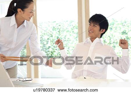 Office workers taking a rest View Large Photo Image Stock Photo - Office workers taking a rest. Fotosearch