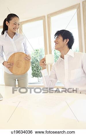 Office workers taking a rest View Large Photo Image Stock Photograph - Office workers taking a rest. Fotosearch