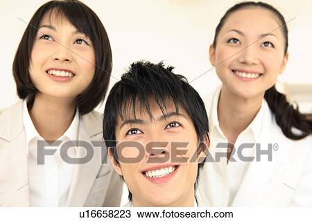 Stock Image - Portrate of Japanese office workers. Fotosearch