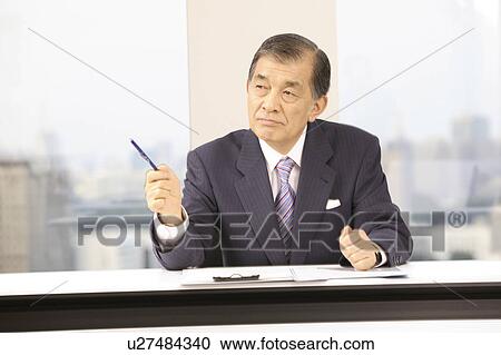 Stock Image - Japanese chief executive officer. Fotosearch