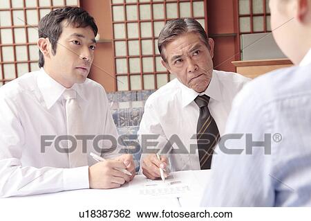 Stock Image - Scene of meeting. Fotosearch