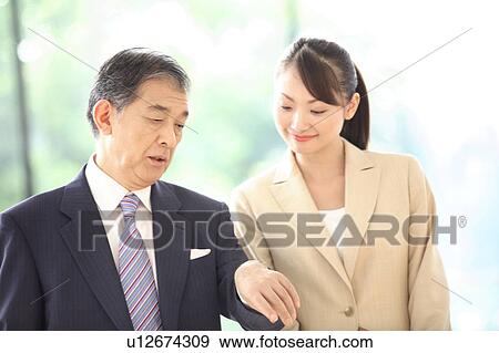 Stock Photo - Chief executive officer and secretary. Fotosearch