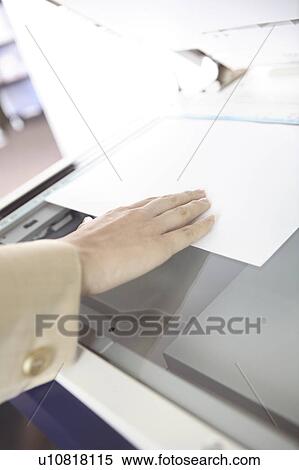 Hand of Japanese office lady taking a copy View Large Photo Image Stock Photography - Hand of Japanese office lady taking a copy. Fotosearch
