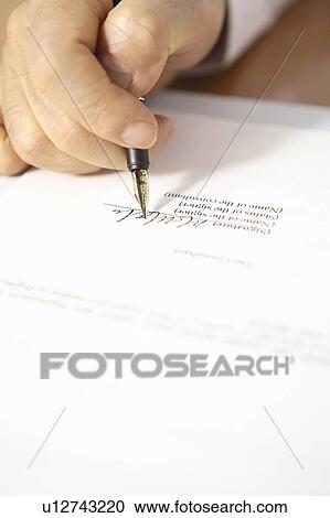 Stock Image - Hand of president signing documents. Fotosearch