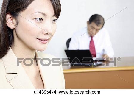 Picture - Japanese chief executive officer and secretary. Fotosearch