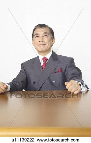 Stock Image - Japanese chief executive officer. Fotosearch