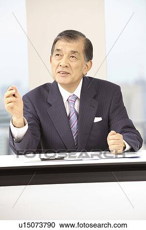 Stock Image - Japanese chief executive officer. Fotosearch