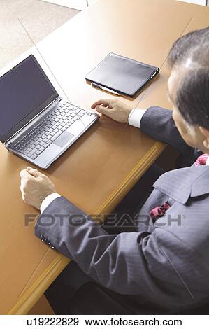 Stock Photo - Japanese chief executive officer. Fotosearch