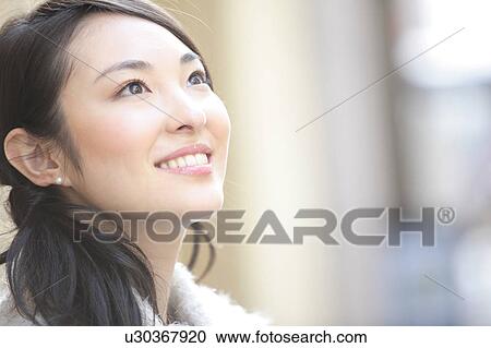 Stock Image - Portrait of Japanese young woman. Fotosearch