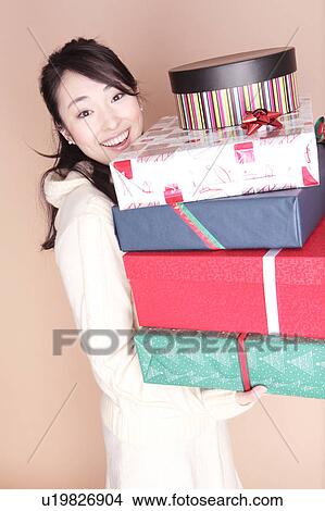 Woman having a lot of boxes View Large Photo Image Picture - Woman having a lot of boxes. Fotosearch