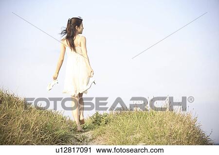 Stock Image - Back figure of Japanese woman. Fotosearch