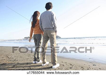 Picture - Japanese couple in Enoshima. Fotosearch