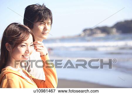 Stock Photo - Japanese couple in Enoshima. Fotosearch