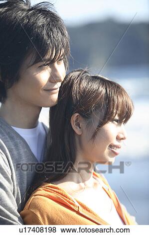 Stock Photo - Japanese couple in Enoshima. Fotosearch
