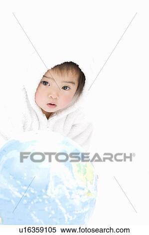 Stock Photography - Baby and globe. Fotosearch