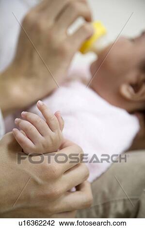 Baby drinking milk View Large Photo Image Stock Image - Baby drinking milk. Fotosearch