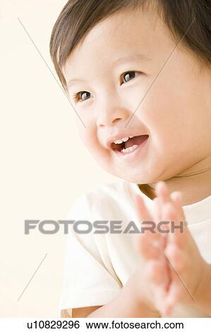 Baby shaking hand View Large Photo Image Stock Photograph - Baby shaking hand. Fotosearch