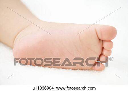 Picture - Baby's foot. Fotosearch