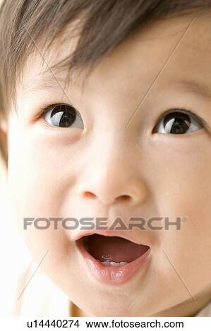 Smiling baby View Large Photo Image Picture - Smiling baby. Fotosearch