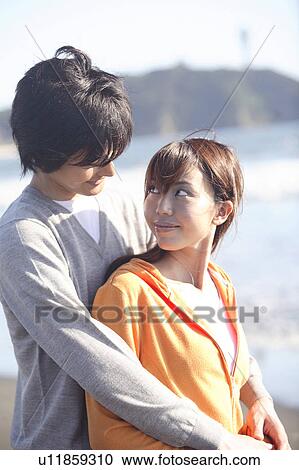 Stock Image - Japanese couple in Enoshima. Fotosearch